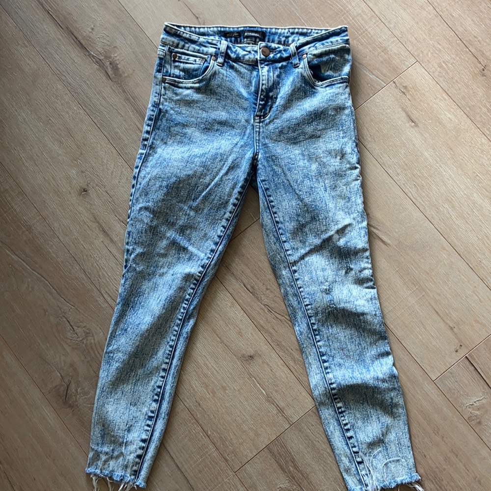 Acid wash blue jeans